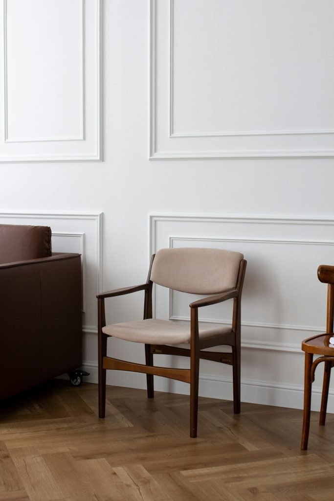 Chair under White Wall in Room